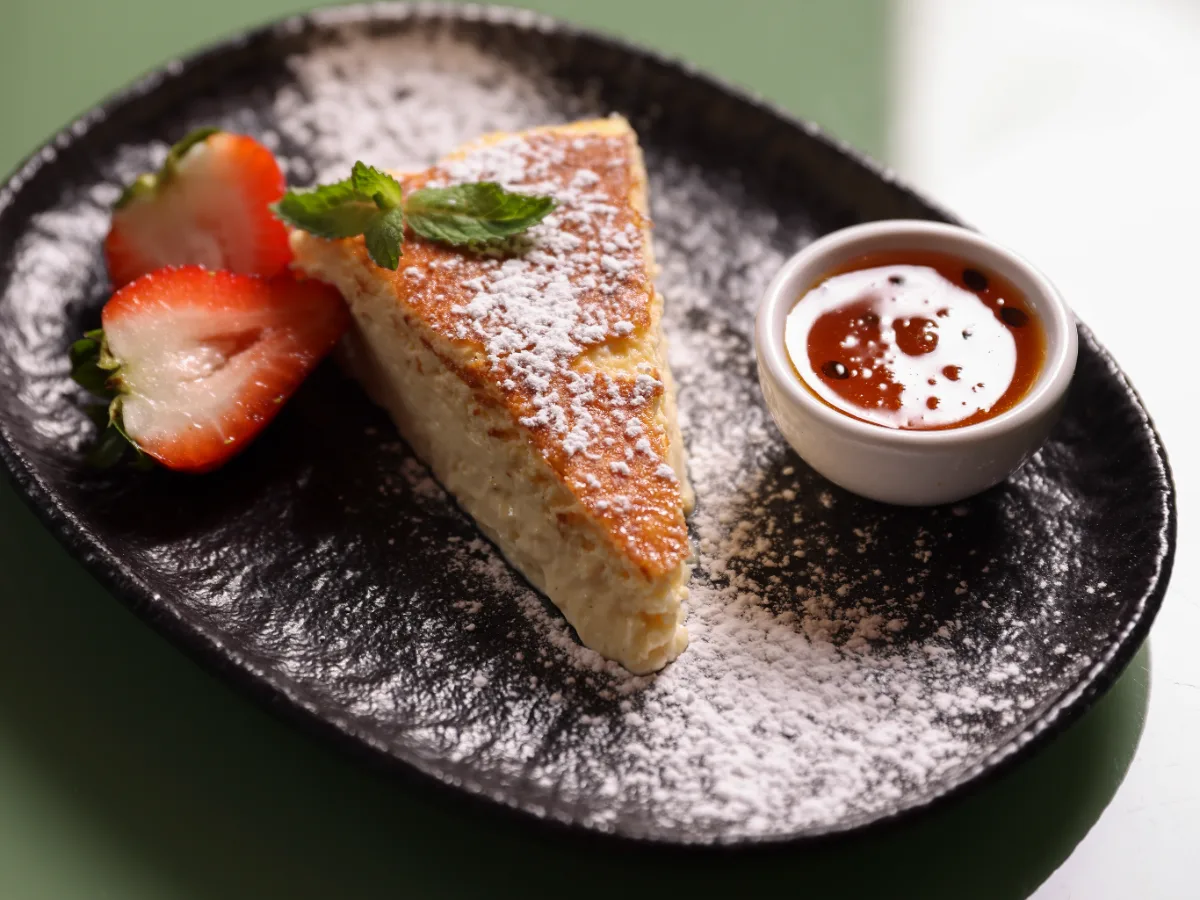 Foto de Cheesecake español con salsa de maracuyá